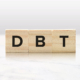A close up of wooden blocks that spell DBT. Learn how a DBT therapist in Torrance, CA can offer support via online DBT therapy and more. Search for EMDR therapy for depression in Las Vegas, NV, and more.
